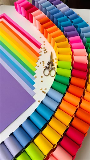 Floriona Fleischer on Instagram: "Color therapy…but make it Christmas.🎄🌈✨ These rainbow paper chains are officially my new favorite holiday décor — and yes, they work great as a scarf too😄 Thanks again to all those who joined the Paper Chain Live craft session last weekend (there were over 200 of you😍)! 👀You can watch the replay on my YouTube channel, linked in the Highlights bubble “Workshops” & in my bio too! Should I share different paper chain styles next? ✨ —— #crafttherapy #christmasc