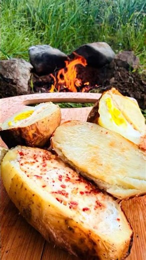 The Ultimate Campfire Egg Potato! 🥔🍳🔥 #shorts #survivalfood #cooking #potatohack #egg #wildfire