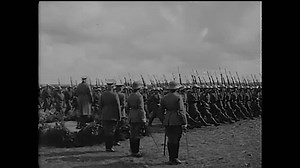 clip-1104158305-circa-1918---soldiers-march-formation-open