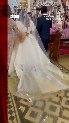 Bride walks down flooded aisle after Typhoon Doksuri - BBC News. #Malolos #BBCNews #Shorts