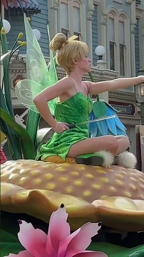 Peter pan, CaptainHook, Tinker Bell and Mickey Mouse on parade.