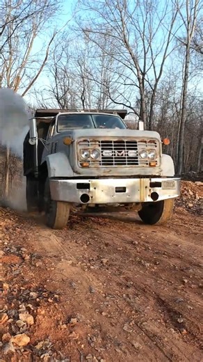GMC 9500 Dump Truck Flying Out of the Woods #trucking #dumptruck