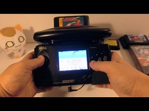 Genesis 32x running on modified Sega Nomad, external pad and other features.