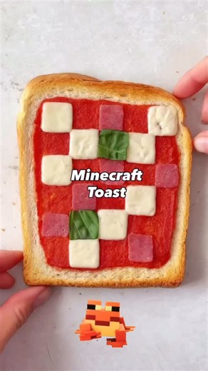 Jenny Yan | Mom blogger on Instagram: "Turn snack time into Minecraft time with this pixel-perfect Minecraft pizza toast! 🍕🟩 Just grab a small square cutter, your fave toppings (e.g. cheese, salami + basil), and build your edible blocks. Spread, layer, bake — and enjoy a fun, melty lunch every little Minecraft fan will love! #minecraftfood #minecraft #minecrafttoast #pizzatoast #funfoodforkids #pixelfood #gamercrafts #easyrecipes #snackideas"