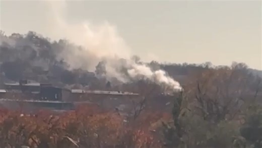 Crews battle large house fire in Newport; smoke plume visible from miles away