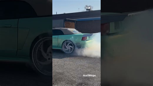 Ford Mustang convertible racecar on 24’s burning out