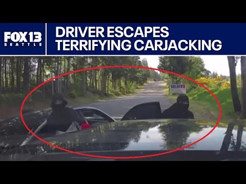 Video shows WA man escape attempted carjacking at gunpoint by ramming their car