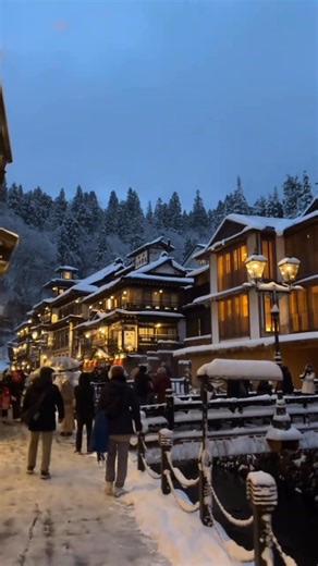 Ginzan Onsen is a picturesque hot spring town in Yamagata, Japan, famous for its nostalgic, Taisho-era (1912-1926) wooden buildings, gas lamps, and Spirited Away-like at- mosphere, especially magical in winter with snow. Lined with traditional ryokan (inns) along the Ginzan River, it offers a unique, historic escape with natural hot springs and beautiful scenery, perfect for day trips or overnight stays. #ginzanonsen #yamagata #snow #snowfall #hotwater #japan #onlyinjapan #beautifuljapan | Routi