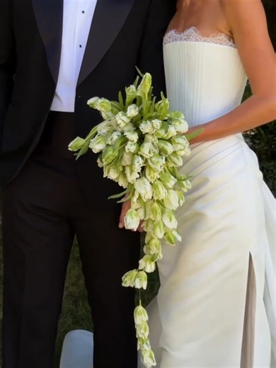 Celebrate the finer things in Eaton. A structured drop waist bodice reveals fine details in a soft lace trim at the neckline and boning channels designed to draw in the eye. An asymmetric drape sweeps across the hip into a fluid column skirt, with a fully detachable sculptural train at the back. The result is a love letter to minimalism, with a romantic edge. Available with or without the lace trim. #bridalfashion #fashiondesign #weddingdress #kyha #dublinweddings