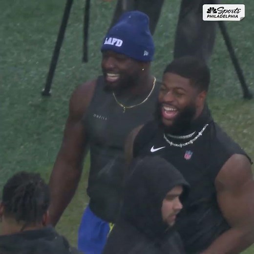 Jared Verse is greeted by Eagles fans and Jalen Carter ahead of playoff matchup