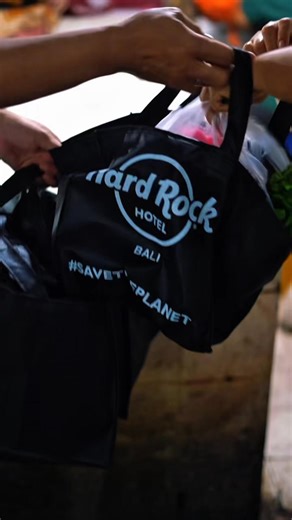 2.5K views · 48 reactions | Going green, one bag at a time. Our band members from Hard Rock Hotel Bali were at the Kuta Market, distributing 300 reusable bags to shoppers. By encouraging everyone to make a simple switch from plastic, we can make a significant difference together in preserving the beauty of our island. We are proud to be a part of the movement to keep Bali beautiful for generations to come. | Hard Rock Hotel Bali | Facebook