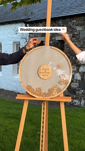 Alternative wedding guestbook idea! How cool is this circle dropbox guestbook?! Share this with someone planning their wedding! Click here for more ways to impress your guests at your wedding: https://weddedwonderland.com/how-guestpix-is-revolutionizing-wedding-memories-globally-with-qr-code-photo-video-sharing/ Video: @weddingsbystagdesign on Instagram | Wedded Wonderland