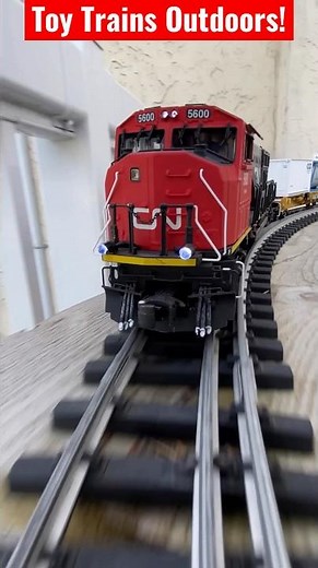 Battery-Converted O Gauge Toy Trains Outdoors! (They look great on sweeping broad curves!)