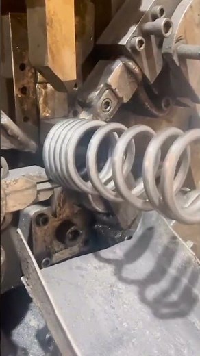 the process of making car springs using machines