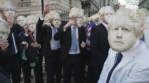 Bewigged 'Boris Johnsons' sing outside Downing Street