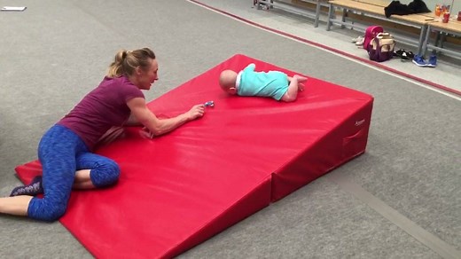 One of our new Fun4baby gymnasts Ryan rolling for the first time . He couldn't roll last week now he's a pro . We also learnt a new technique for helping with digestion whilst having fun with small balls and a rhyme. | Leeds Gymnastics Club
