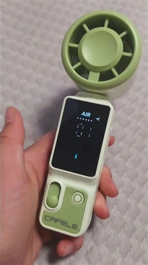 This Smart Handheld Fan Has a Digital Display! 🌬️