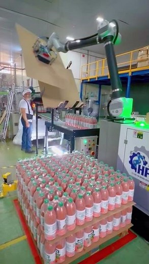 Collaborative Palletizing Robot: Palletizing & Slip Sheet Placing in Operation.