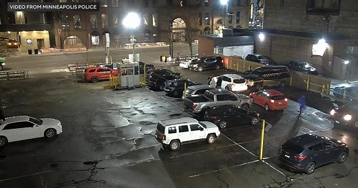 Raw video: Surveillance vid tracks parking lot shooting suspect grabbing gun from car