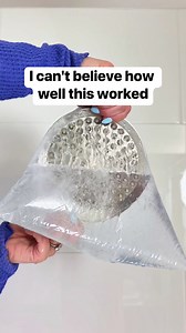 I use a vinegar soak to deep clean my bathroom shower head #shower #bathroom #cleaning #vinegar | Liz & Jeff