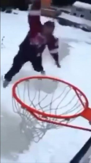 DUNKING A BASKETBALL ON ICE SKATES