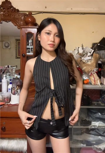 Stylish Backless Top with Leather Shorts