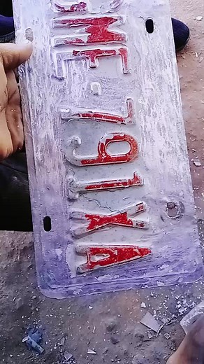 License Plate Sanding and Painting Process