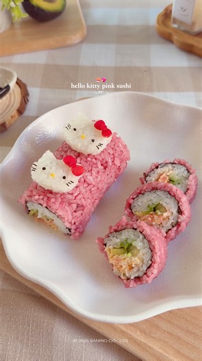 May Mahasiri | Food Content Creator 👩🏻‍🍳💓 on Instagram: "Happy National Pink Day! 💖🍣 Teamed up with @sanrio to roll out the cutest pink @hellokitty sushi—because who says sushi can’t be kawaii? 🎀 I used beetroot powder to naturally tint the rice that perfect blush pink, then filled each roll with spicy crab meat, avocado, and cucumber for a little kick and crunch. 💗 Creating this was such a fun throwback to my Hello Kitty-loving days growing up, and I’m so happy I got to bring her to lif