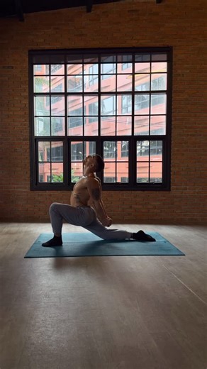 Lewis | Rehab & Performance on Instagram: "The Dead Man’s Lunge is 1 of only 3 stretches you need for full body mobility. It forces your whole front chain to lengthen. You get the hip flexors, quads, chest and shoulders all opening on while the spine bends into a clean C-shape. It’s a dynamic stretch, so you don’t sink and sleep in the position. You bounce, you breathe and you drive the hips forward until the whole front body starts to open. How to do it: – Set up in a low lunge with the back le