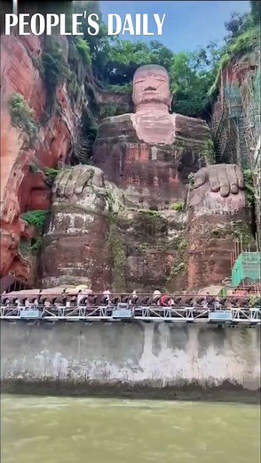 38K views · 2.7K reactions | Meet the 71-meter-tall Leshan Giant Buddha. Located in southwest China’s Sichuan Province, the world's largest stone Buddha was carved out of a hillside in the 8th century with rivers flowing below its feet. | People's Daily, China | Facebook