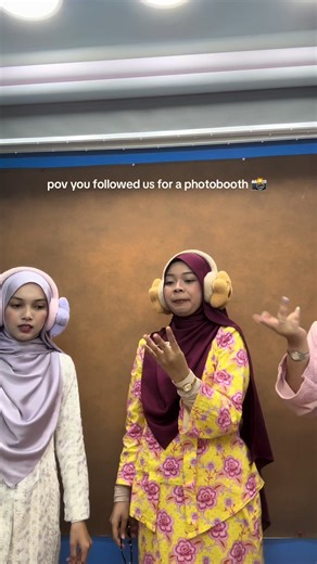 Girls Having Fun in a Photobooth Experience