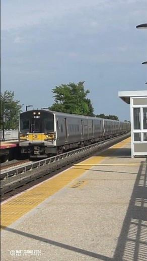 Long Island Rail Road (LIRR) M7 train at Locust Manor Station.
