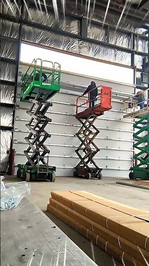 Installing Sections on this GINORMOUS 25 x 24 Overhead Door