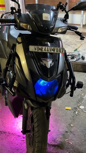 NRA MODIFICATIONS on Instagram: "First in India revolving Light installation TVS NTROQU WITH Many Sparts also ⚡️CRASH GUARD ⚡️RCB GRIPS ⚡️HJG fog light ⚡️MOTOGENIOUS CLAMP ⚡️April-a Mod-guard #motoinstagram #followforfollowback #highlights #tvsntorq125 #viralreels"