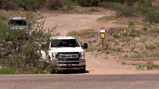Outside the roadblock to Sen. John McCain's Cornville, Arizona, home on Friday