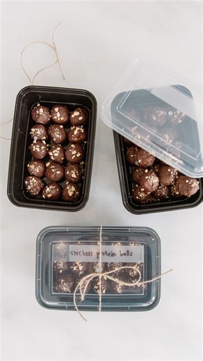 Home & Kind on Instagram: "We overthink doing kind things way too much. But a small treat dropped off just because can mean more than you think. These Snickers Protein Balls from my friend Maria @twopeasandpod are the perfect thing to double and share—and I always keep these containers on hand for easy gifting. Comment RECIPE and I’ll send you the recipe and the containers I use!"