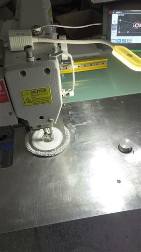Robot replacement cloth hole punching and overlocking machine