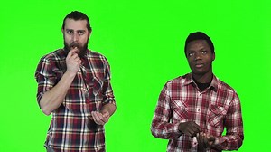 Men eating french fries - Free Stock Video