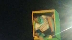 Prankster climbs inside speed camera to 'flash' oncoming drivers