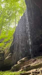 Visitors to the Historic Entrance of Mammoth Cave are greeted by this waterfall which flows from a spring located on the hillside above. #InternationalWaterfallDay 🎥 Water flows over a rock ledge into a cave entrance. | Mammoth Cave National Park