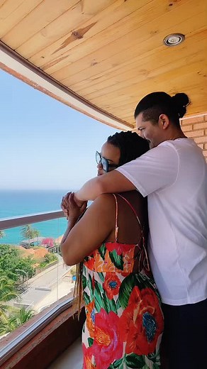 Venezuelan Balcony Embrace: A Scenic Ocean View
