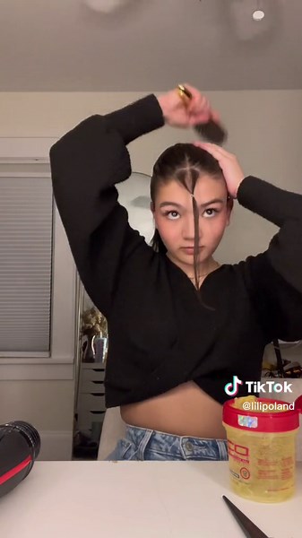 Slick Ponytail Hairstyle with Tendrils: Party Hair Inspiration