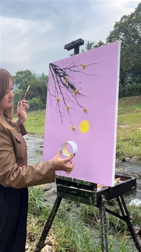 Art Viral 🎨 on Instagram: "Ling is a Chinese artist who lets nature become her brush. She coats leaves, grass, and branches with paint, then presses and strikes them onto the canvas, transferring their natural shapes and textures in a single, expressive movement. The outcome feels both instinctive and deliberate — trees, fields, and organic forms emerge instantly, made by the very elements they depict. Her work turns an unconventional action into a compelling painting method, balancing control 