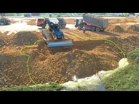 Oh! Be Careful Accident Big Landslide Down With a Dozer While Pushing Soil in Water Landfilling Up