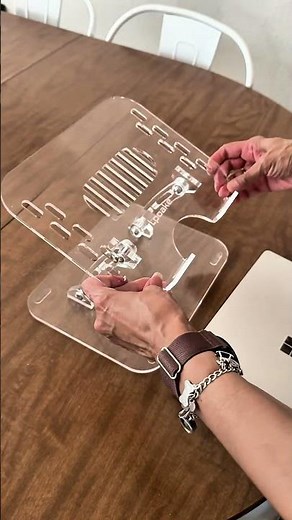 This adjustable acrylic laptop stand makes it easy looks good, lifts my laptop.