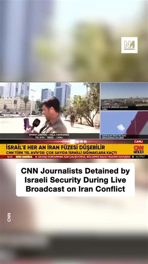 Israel has detained two CNN journalists who were covering the aftermath of an Iranian missile strike in Tel Aviv, according to media reports. Reporter Emrah Çakmak and cameraman Halil Kahraman were live on air for CNN Türk near the IDF's Kirya military headquarters when officers approached them and forced them to end the broadcast on Tuesday. Part of their report was about civilians emerging from bomb shelters. During the broadcast, a hand can be seen covering the camera lens before a voice says