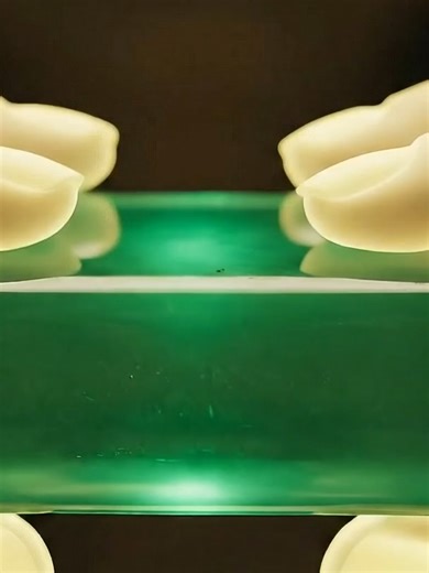 Breaking a bar of glowing mint crystal! 🤯 That snap is unmatched. Dive deeper on YouTube – link in bio! #ASMRCrunch #CrystalCandy #MintChocolate #SatisfyingSnap #FoodASMR