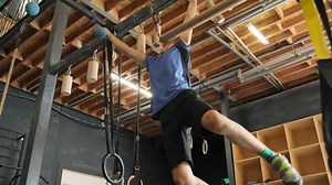 clip-3434542701-instructor-conducts-training-boy-grip-strength-small