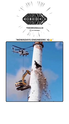 Zeeldom on Instagram: "The video shows a helicopter lifting a yellow excavator to demolish a tall white chimney. The excavator repeatedly strikes the top, sending up clouds of dust and debris. Surprisingly, the chimney bends unnaturally before collapsing in a curved fall. The scene transitions to a sunset as the helicopter struggles to maintain its position. The clip appears to be AI-generated or CGI, as real concrete chimneys do not bend in this way. The original source is unclear, though simil