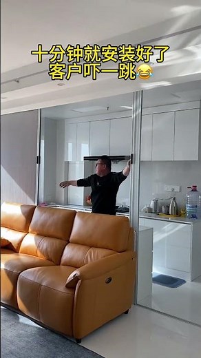 Install a sliding door to isolate cooking fumes in an open kitchen